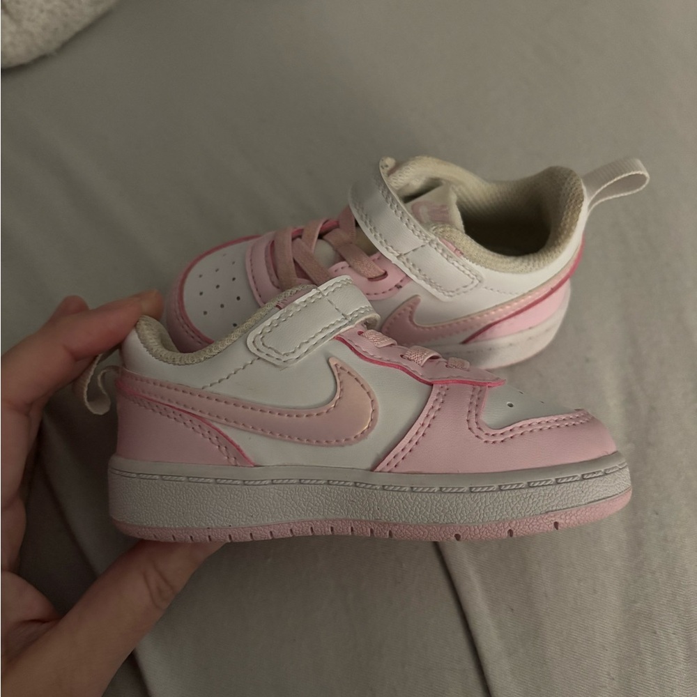 Nike Pink and White Sneakers with Classic Design